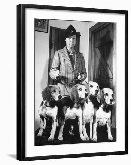 Mrs. William Dupont Jr. Holding Reins of Four Beagles That Belonged to Her Late Husband-Hansel Mieth-Framed Photographic Print