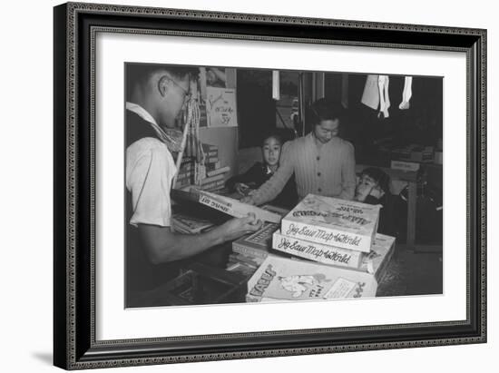 Mrs. Yaeko Nakamura and Family Buying Toys with Fred Moriguchi-Ansel Adams-Framed Art Print
