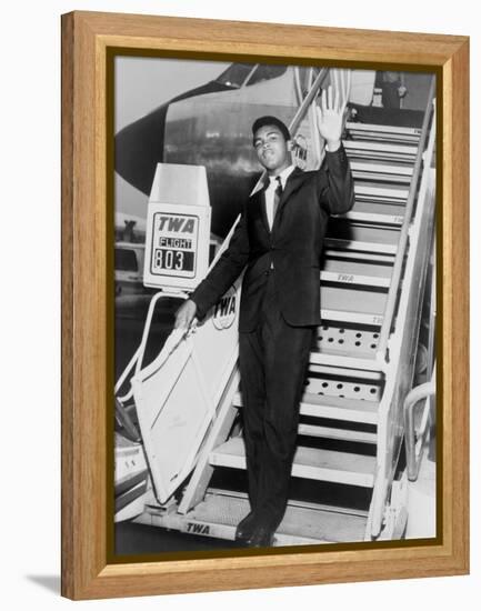 Muhammad Ali, Waves from the Steps of a TWA Airplane at JFK Airport, NYC, 1964-null-Framed Stretched Canvas