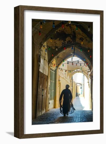 Mullah hurrying down typical vaulted alleyway, Yazd, Iran, Middle East-James Strachan-Framed Photographic Print