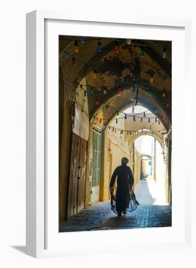 Mullah hurrying down typical vaulted alleyway, Yazd, Iran, Middle East-James Strachan-Framed Photographic Print