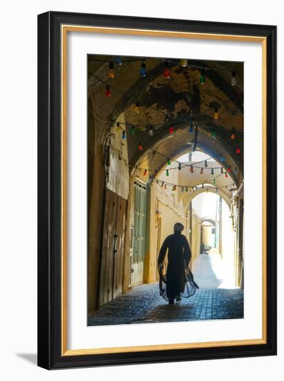 Mullah hurrying down typical vaulted alleyway, Yazd, Iran, Middle East-James Strachan-Framed Photographic Print