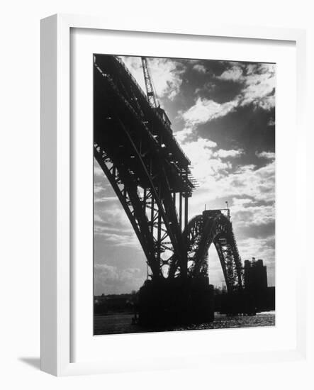 Multiple Arc Bridge under Construction Across the Dnieper River Below the World's Largest Dam-Margaret Bourke-White-Framed Photographic Print