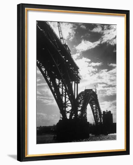 Multiple Arc Bridge under Construction Across the Dnieper River Below the World's Largest Dam-Margaret Bourke-White-Framed Photographic Print