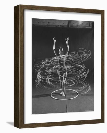 Multiple Exposure of a Woman Playing with a Hula Hoop-J^ R^ Eyerman-Framed Photographic Print