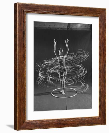 Multiple Exposure of a Woman Playing with a Hula Hoop-J^ R^ Eyerman-Framed Photographic Print