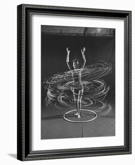 Multiple Exposure of a Woman Playing with a Hula Hoop-J^ R^ Eyerman-Framed Photographic Print