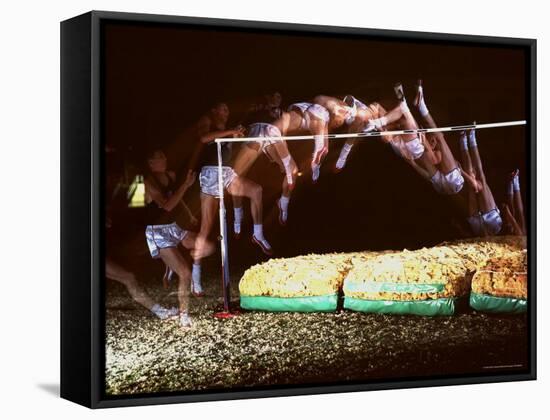 Multiple Exposure of Dick Fosbury in Action During High Jump at Summer Olympics-Michael Rougier-Framed Premier Image Canvas