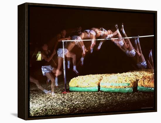 Multiple Exposure of Dick Fosbury in Action During High Jump at Summer Olympics-Michael Rougier-Framed Premier Image Canvas