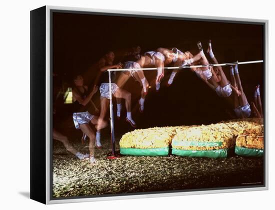 Multiple Exposure of Dick Fosbury in Action During High Jump at Summer Olympics-Michael Rougier-Framed Premier Image Canvas