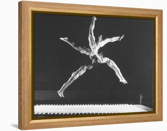 Multiple Exposure Shot of a Gymnast Jumping on a Trampoline-J^ R^ Eyerman-Framed Premier Image Canvas