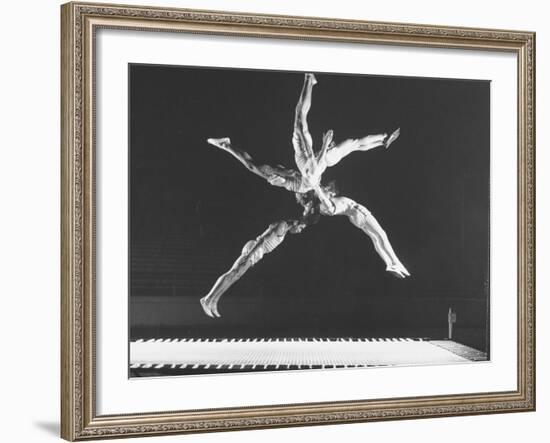 Multiple Exposure Shot of a Gymnast Jumping on a Trampoline-J^ R^ Eyerman-Framed Photographic Print