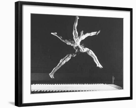 Multiple Exposure Shot of a Gymnast Jumping on a Trampoline-J^ R^ Eyerman-Framed Photographic Print