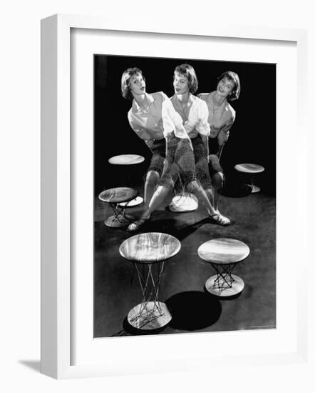 Multiple Exposure Showing Woman Oscillating on a Teeter Seat Designed by Isamu Noguchi-Eliot Elisofon-Framed Photographic Print