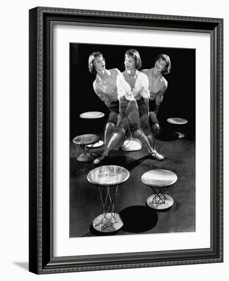 Multiple Exposure Showing Woman Oscillating on a Teeter Seat Designed by Isamu Noguchi-Eliot Elisofon-Framed Photographic Print