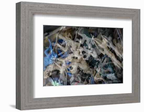 Multiple exposures of toy army men-null-Framed Photo