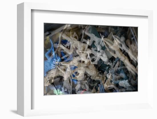 Multiple exposures of toy army men-null-Framed Photo