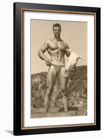 Muscle Man holding Cow Skull-null-Framed Art Print