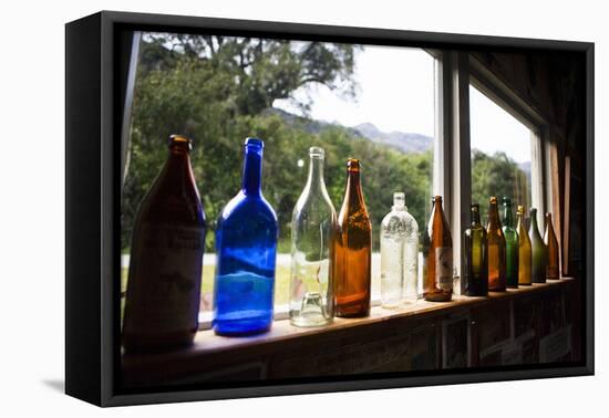 Museum Interior with Historical Tools, Milford Sound, New Zealand-Micah Wright-Framed Premier Image Canvas