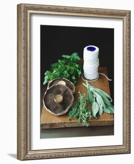 Mushrooms, Fresh Herbs & Kitchen String on Chopping Board-Michael Paul-Framed Photographic Print