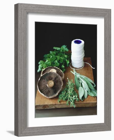 Mushrooms, Fresh Herbs & Kitchen String on Chopping Board-Michael Paul-Framed Photographic Print