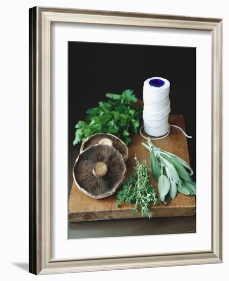 Mushrooms, Fresh Herbs & Kitchen String on Chopping Board-Michael Paul-Framed Photographic Print