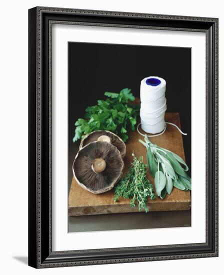 Mushrooms, Fresh Herbs & Kitchen String on Chopping Board-Michael Paul-Framed Photographic Print