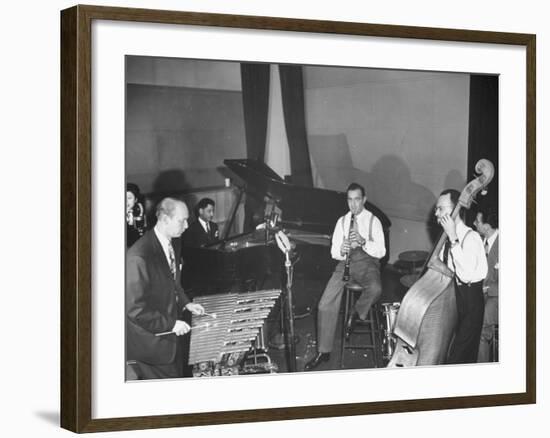 Musician Benny Goodman Playing the Clarinet While Making a Record-null-Framed Photographic Print