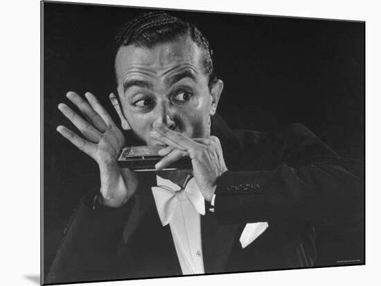 Musician Larry Adler Playing Harmonica-Gjon Mili-Mounted Premium Photographic Print