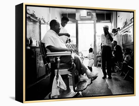 Musician Louis Armstrong in His Neighborhood Barber Shop-John Loengard-Framed Premier Image Canvas