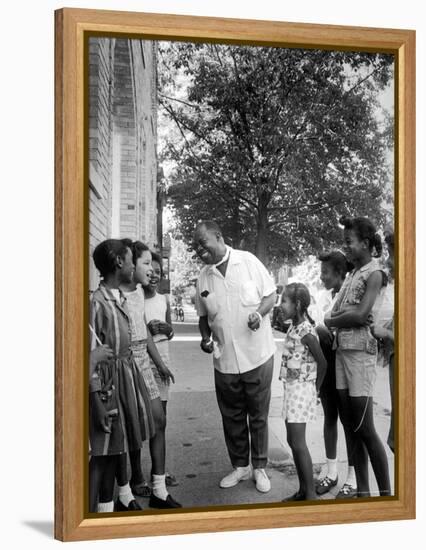 Musician Louis Armstrong with Neighborhood Kids-John Loengard-Framed Premier Image Canvas