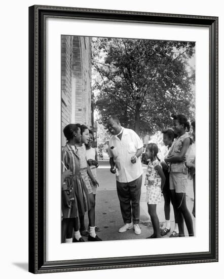 Musician Louis Armstrong with Neighborhood Kids-John Loengard-Framed Premium Photographic Print