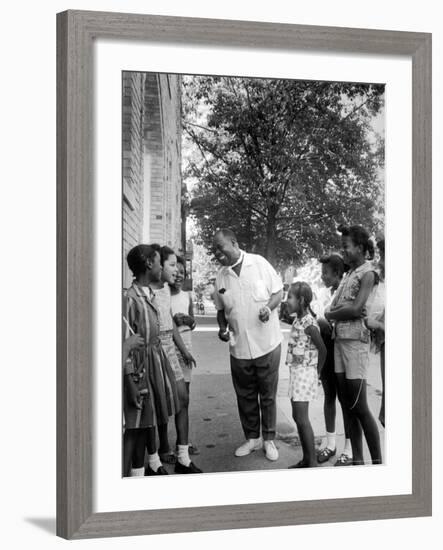 Musician Louis Armstrong with Neighborhood Kids-John Loengard-Framed Premium Photographic Print