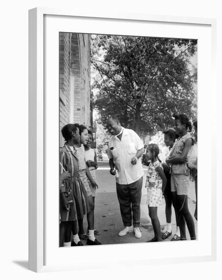 Musician Louis Armstrong with Neighborhood Kids-John Loengard-Framed Premium Photographic Print