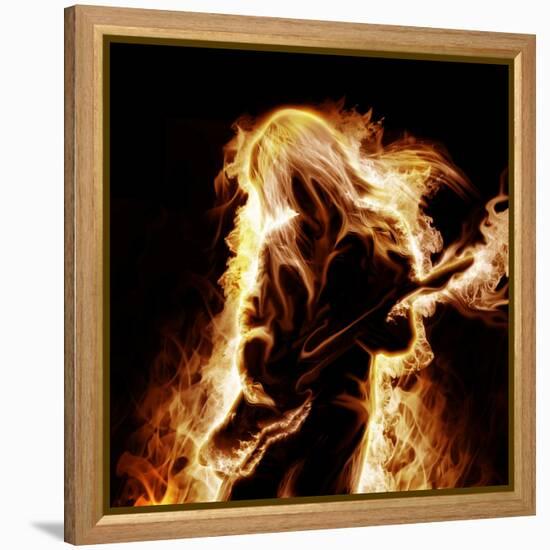 Musician With An Electronic Guitar Enveloped In Flames On A Black Background-Sergey Nivens-Framed Stretched Canvas