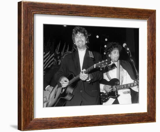 Musicians George Harrison and Bob Dylan Performing at Rock and Roll Hall of Fame-David Mcgough-Framed Premium Photographic Print