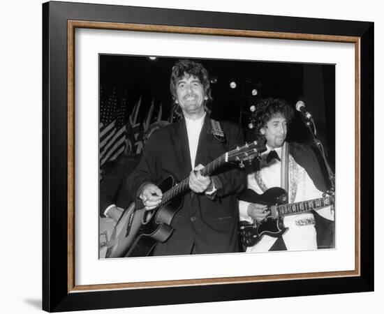 Musicians George Harrison and Bob Dylan Performing at Rock and Roll Hall of Fame-David Mcgough-Framed Premium Photographic Print