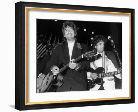 Musicians George Harrison and Bob Dylan Performing at Rock and Roll Hall of Fame-David Mcgough-Framed Premium Photographic Print