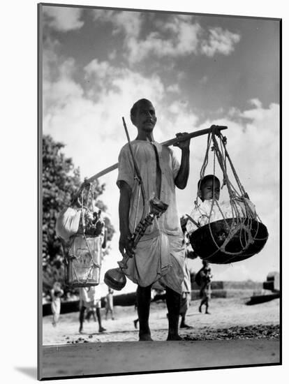 Muslim Man carrying his son and hookah in Convoy to West Punjab to Escape Anti Muslim Sikhs-Margaret Bourke-White-Mounted Photographic Print