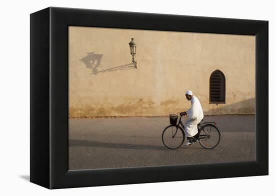 Muslim Man Dressed in White on Bicycle in Old Quarter, Medina, Marrakech, Morocco-Stephen Studd-Framed Premier Image Canvas