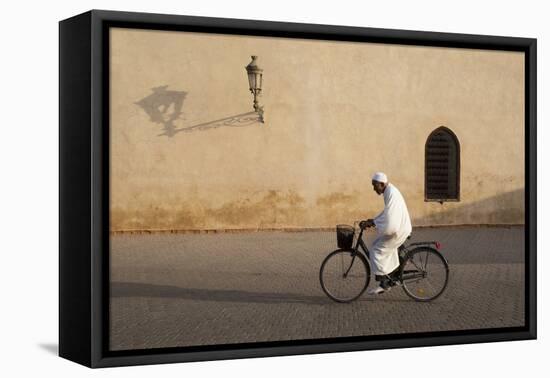 Muslim Man Dressed in White on Bicycle in Old Quarter, Medina, Marrakech, Morocco-Stephen Studd-Framed Premier Image Canvas