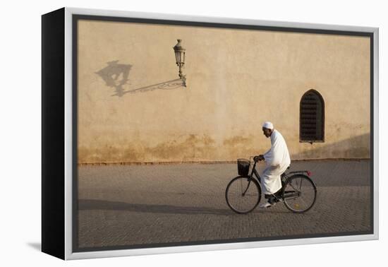 Muslim Man Dressed in White on Bicycle in Old Quarter, Medina, Marrakech, Morocco-Stephen Studd-Framed Premier Image Canvas