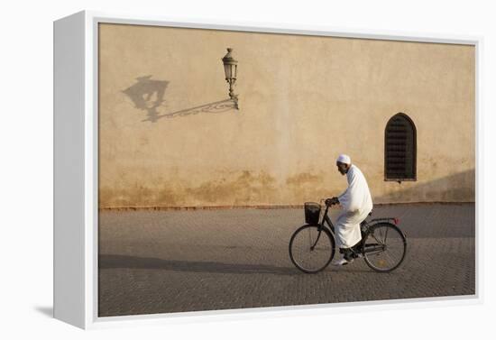 Muslim Man Dressed in White on Bicycle in Old Quarter, Medina, Marrakech, Morocco-Stephen Studd-Framed Premier Image Canvas