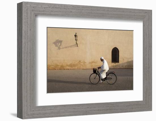 Muslim Man Dressed in White on Bicycle in Old Quarter, Medina, Marrakech, Morocco-Stephen Studd-Framed Photographic Print