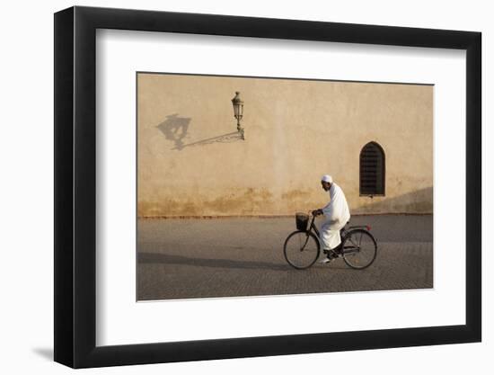 Muslim Man Dressed in White on Bicycle in Old Quarter, Medina, Marrakech, Morocco-Stephen Studd-Framed Photographic Print