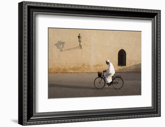 Muslim Man Dressed in White on Bicycle in Old Quarter, Medina, Marrakech, Morocco-Stephen Studd-Framed Photographic Print