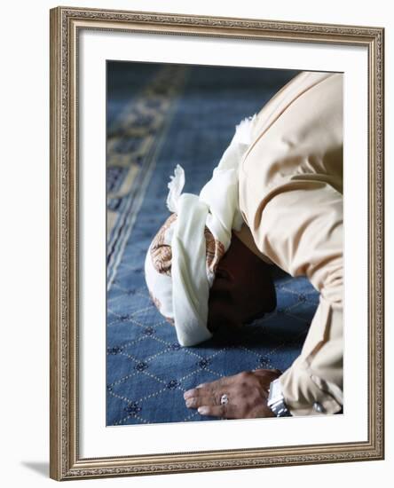 Muslim Man Praying, Dubai, United Arab Emirates, Middle East-null-Framed Photographic Print