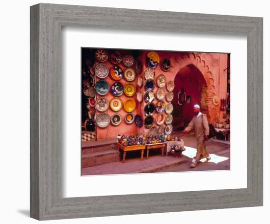 Muslim Man Walks by Wall of Moroccan Pottery, Marrakech, Morocco-John & Lisa Merrill-Framed Photographic Print