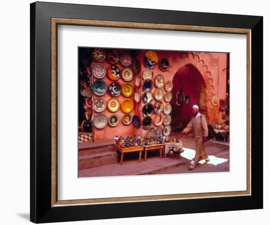 Muslim Man Walks by Wall of Moroccan Pottery, Marrakech, Morocco-John & Lisa Merrill-Framed Photographic Print