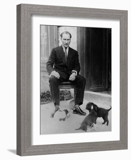 Mustafa Kemal Ataturk, President of Turkey, with His Pet Dogs, Ca. 1930-null-Framed Photo